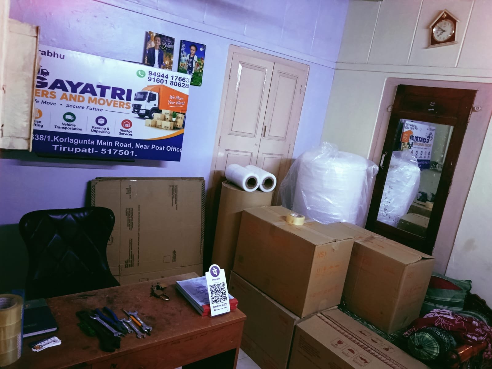 Packing boxes and protective wrapping at Gayatri Packers and Movers office